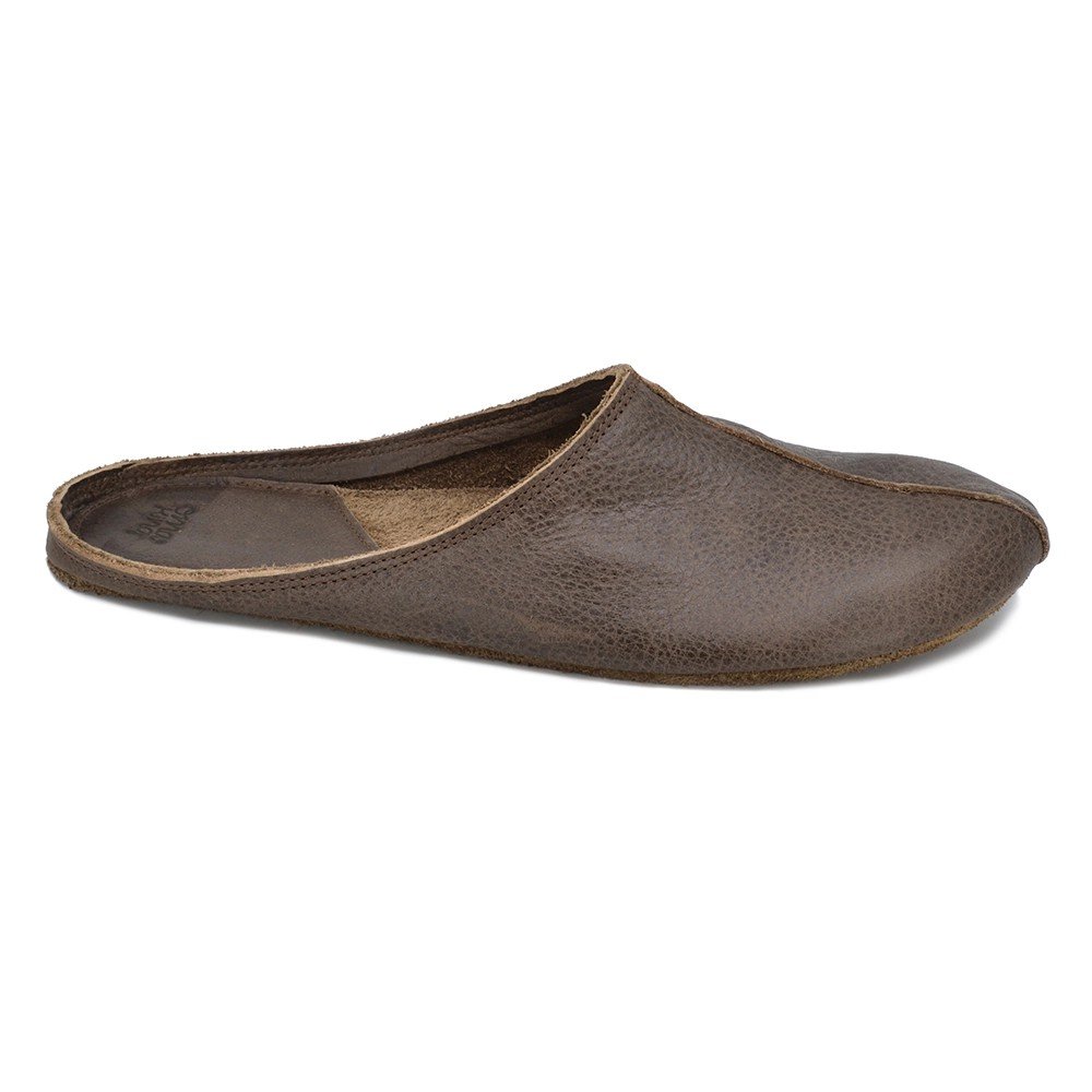 2. Dark brown unisex leather slippers with wide toe area shown in side view on white background