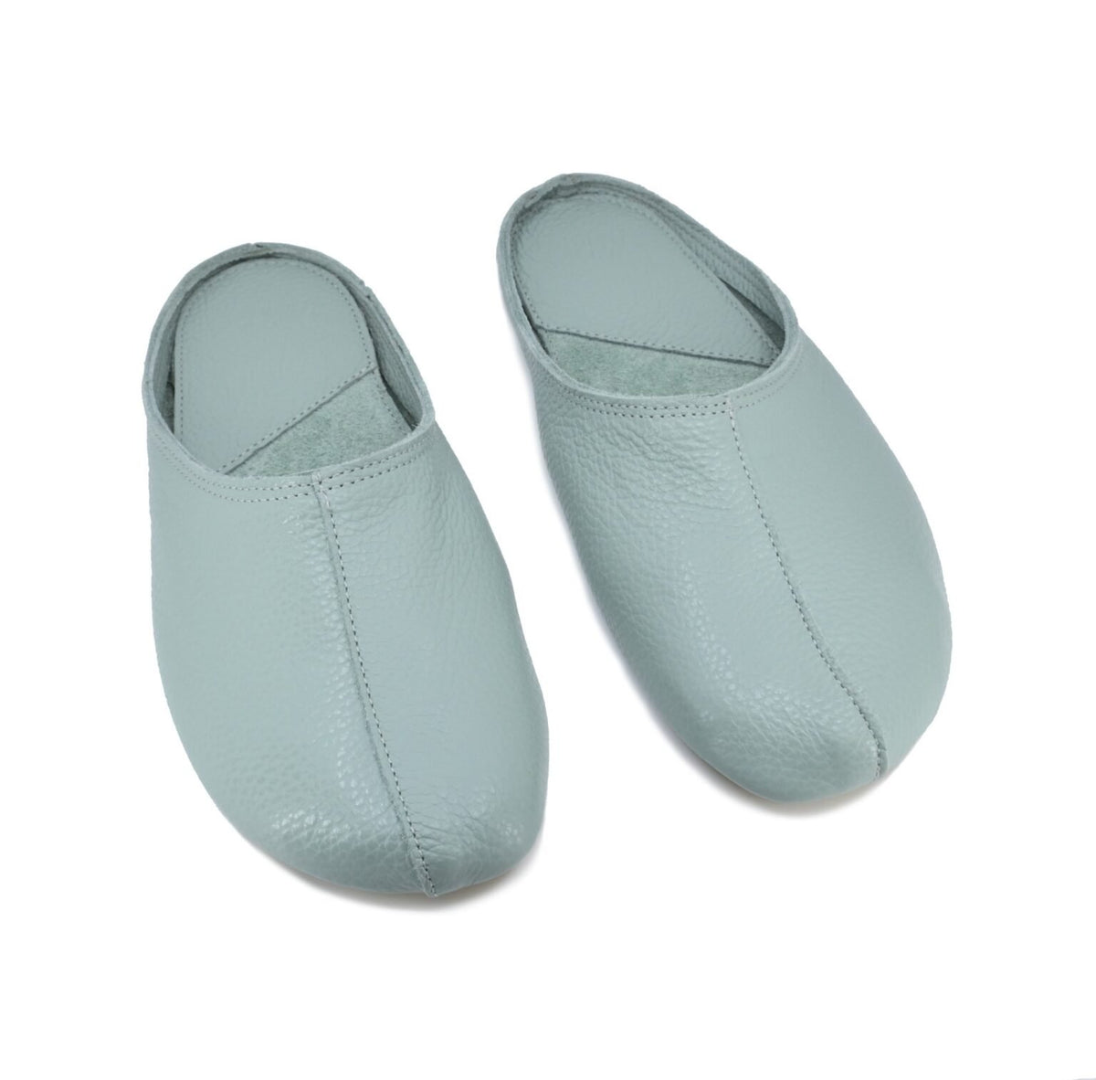 4. Close-up of mint Sulbi slippers by Omaking, emphasizing soft leather texture and seamless design