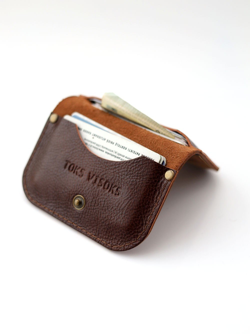 3. Side view of open TOKS VISOKS SUNDAY wallet in marble brown leather with cards inside