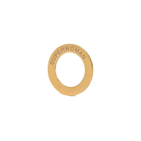 7. Close-up of gold-plated stainless steel ring engraved with 'SUPERWOMAN' from Olla Silk Ribbon Bracelet