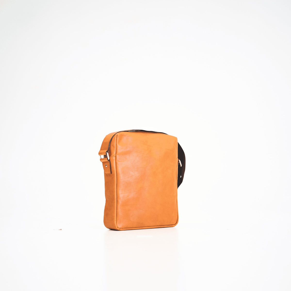 2. Studio shot of Papillon large shoulder bag No. 38 in natural leather, showing front view with adjustable strap