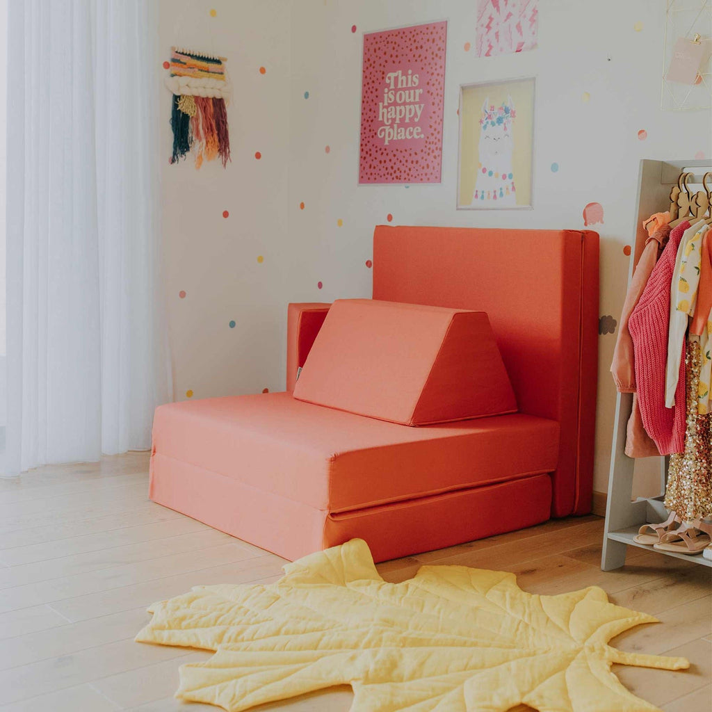 2. Coral activity play mattress set arranged as a sofa with trapezoidal pillows in a decorated room