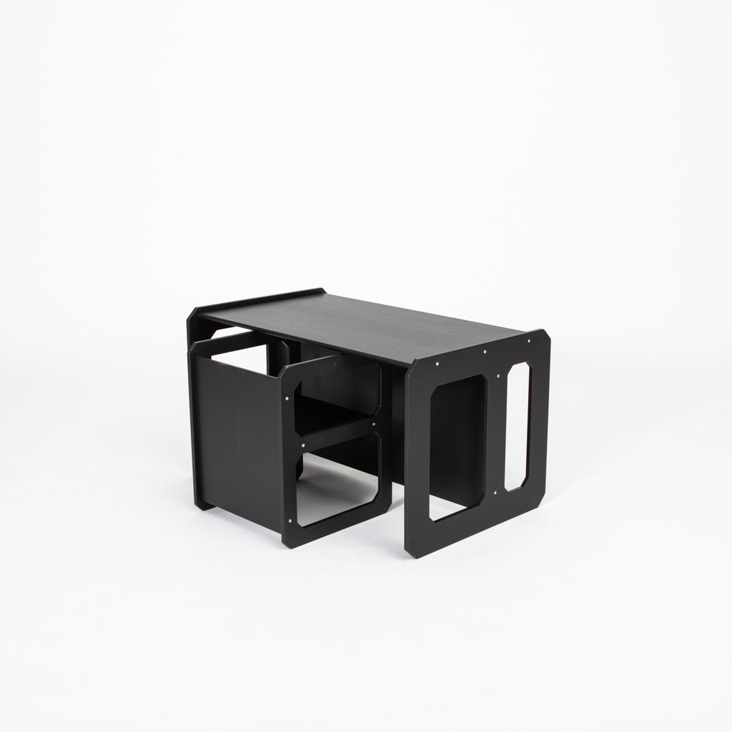 14. Black Montessori weaning table and chair set shown from side on a white background