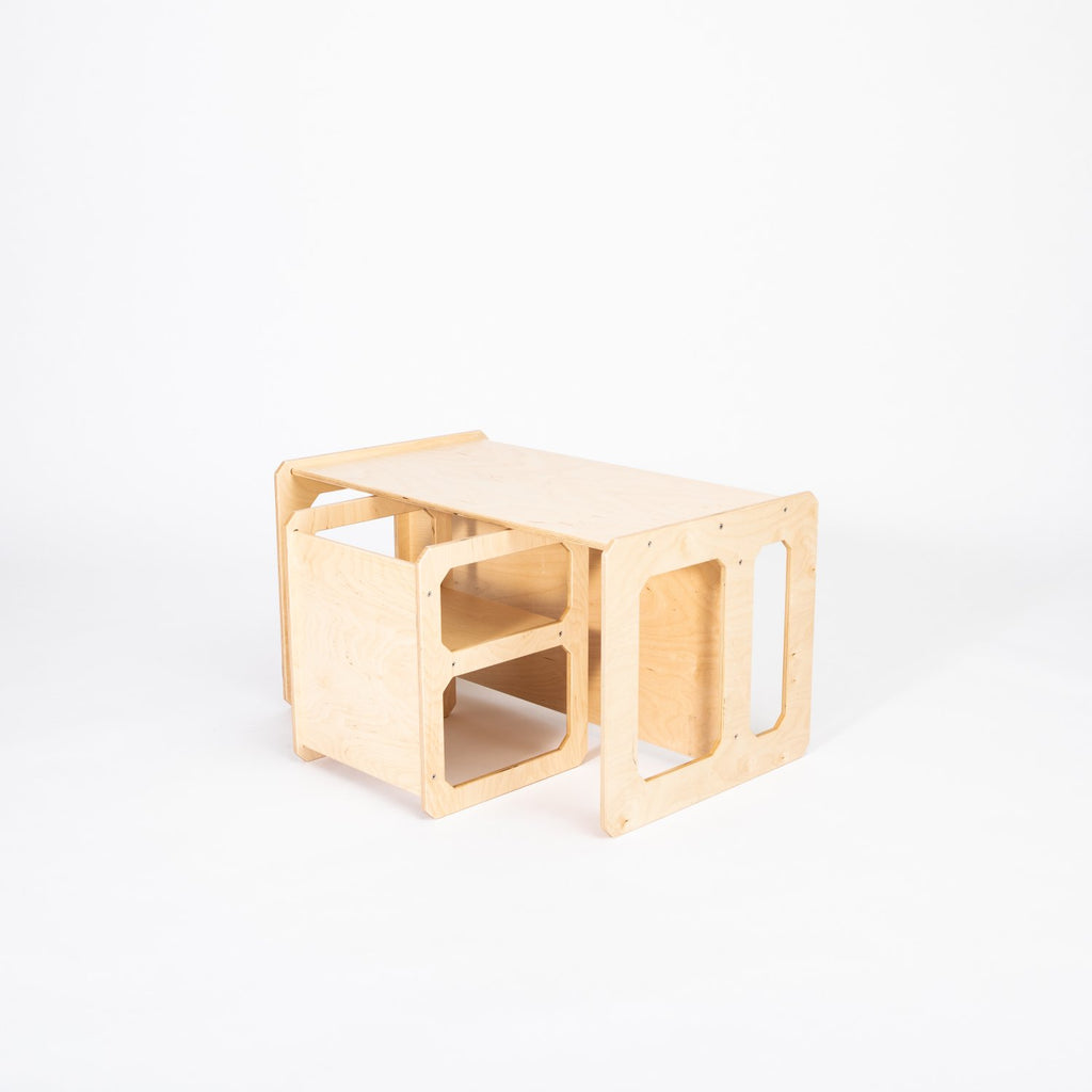 12. Natural wood Montessori weaning table and chair set shown from side on a white background