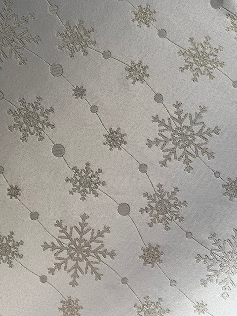 3. Close-up of Golden Snowfall table runner showing intricate golden snowflake pattern on polyester fabric