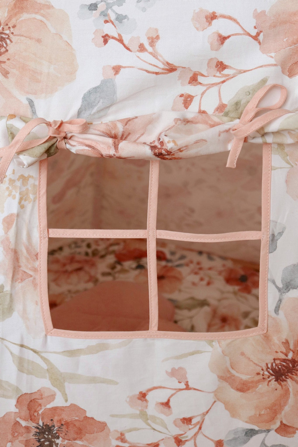 7. Close-up of window detail on floral teepee tent with pink trim