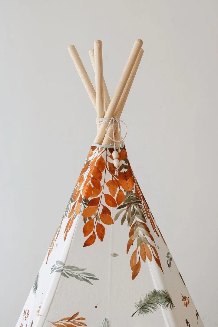 6. Close-up of teepee tent top with wooden poles and autumn leaf pattern