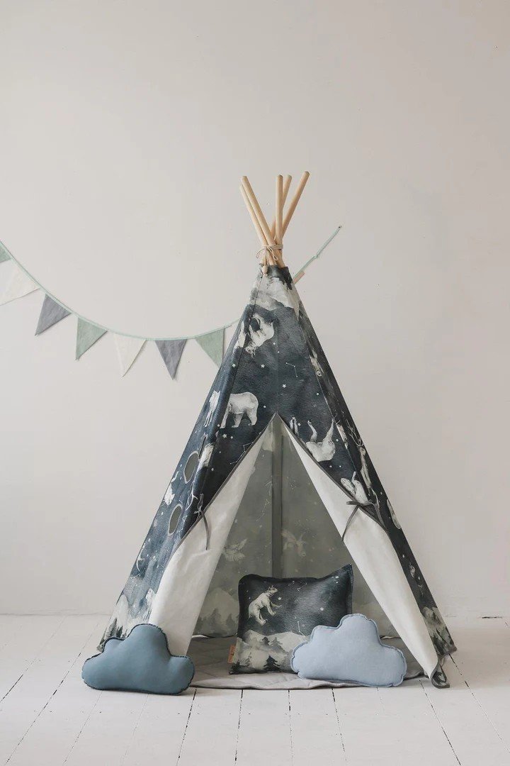 1. Children's teepee tent with starry animal pattern, set up in a minimalistic room with cloud-shaped pillows and bunting
