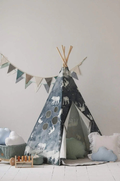 1. Children's teepee tent with starry animal pattern in a cozy room setting, featuring decorative pillows and toys, against a white wall with bunting