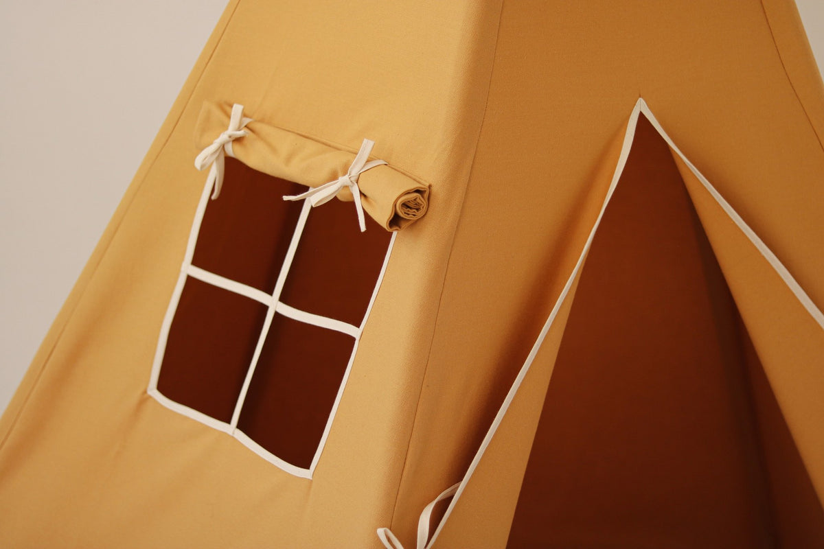 3. Close-up of orange teepee tent window with curtain detail