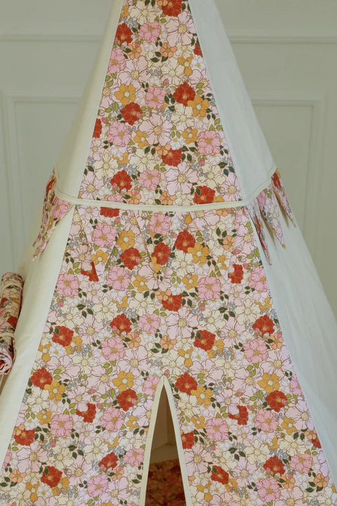 3. Close-up of floral pattern on children's teepee tent with bunting detail