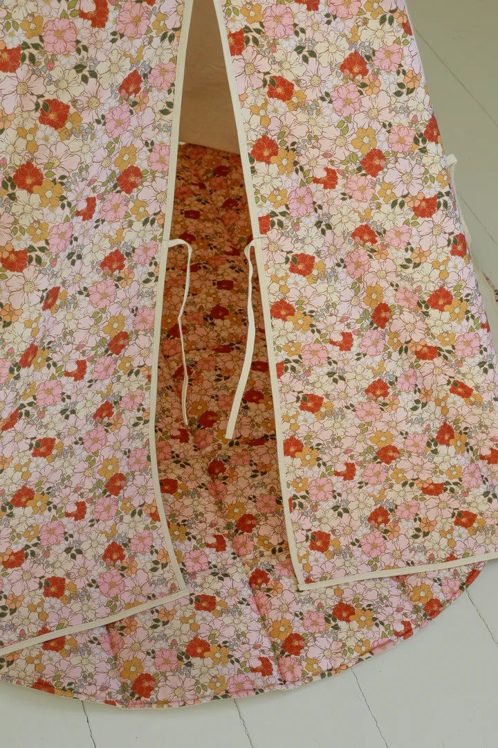 3. Close-up of floral entrance detail on children's teepee tent with open flaps