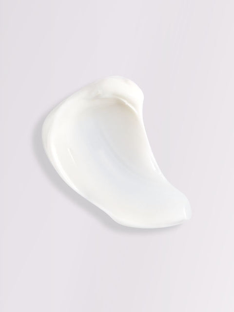 4. Close-up of Magrada Organic Cosmetics Peony Body Cream texture on light background