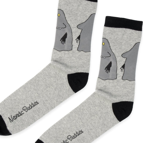3. Close-up of grey Moomin socks with The Groke design, highlighting NordicBuddies logo