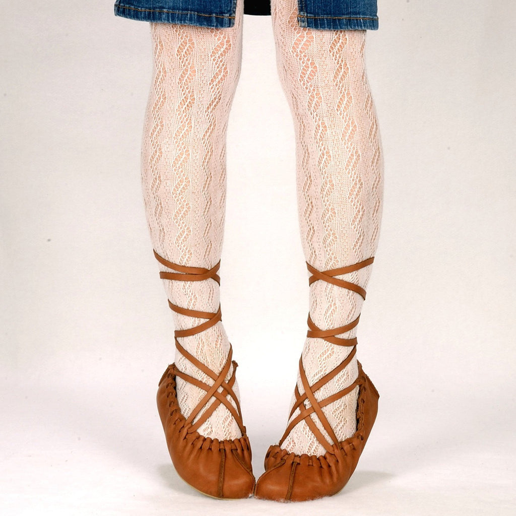 2. Women's upgraded tied dancing shoes by Omaking, paired with lace tights and denim skirt, shown in lifestyle setting