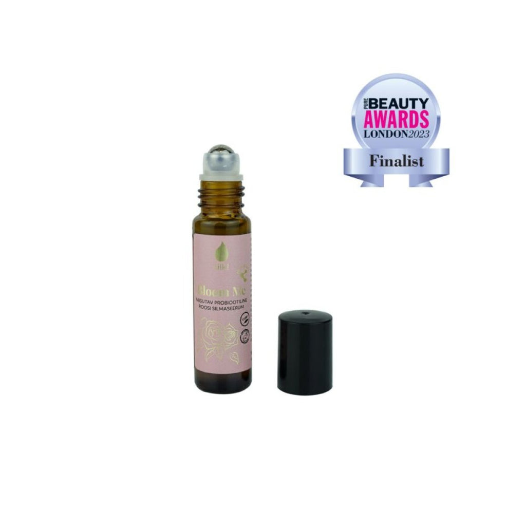 1. Tilk! Bloom Me Moisturising Probiotic Rose Eye Serum with open cap, featuring award finalist badge