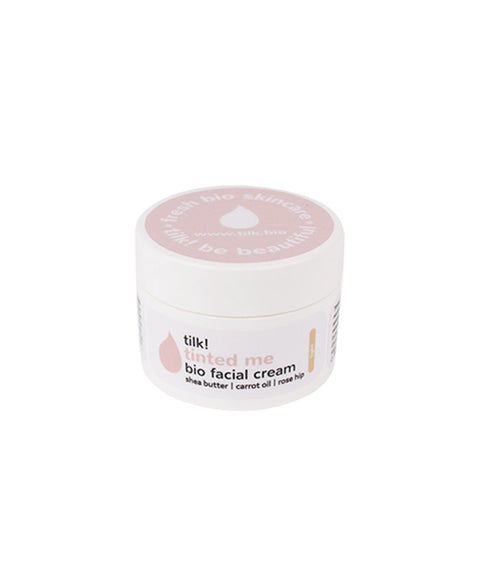 4. Open jar of Tilk! Tinted Me BB cream showing medium shade, enriched with cowslip and almond oil