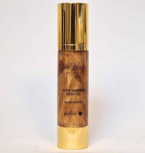 3. North Beauty Glow Shimmer Body Oil in studio setting, highlighting golden shimmer and branding