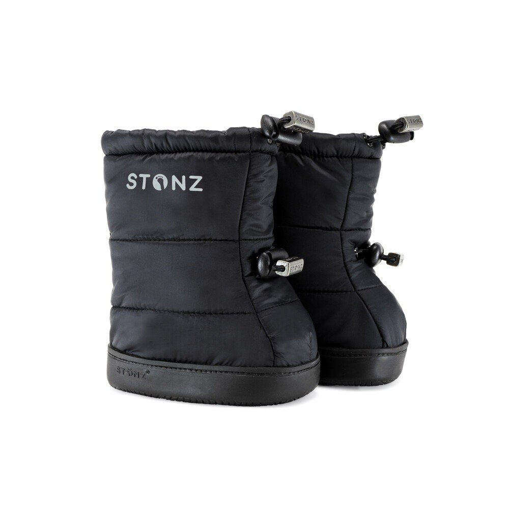 1. Black toddler puffer booties by Stonz with adjustable fasteners and non-slip rubber soles, shown in a studio setting