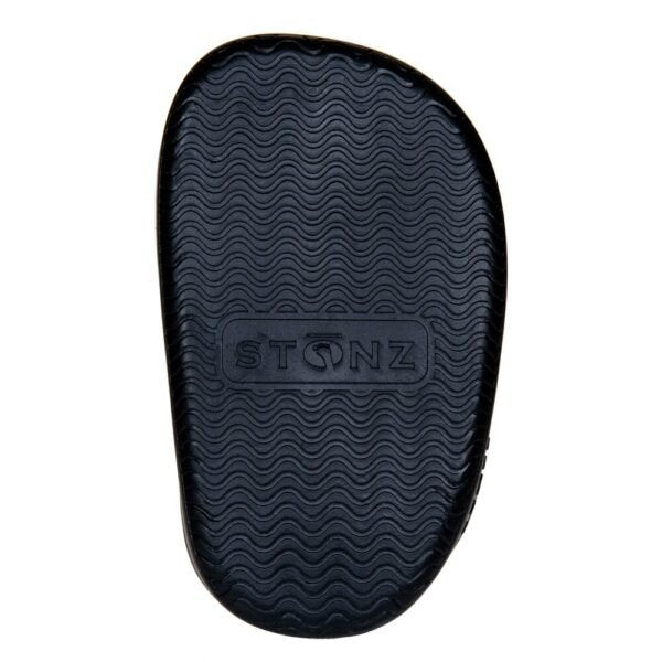 3. Close-up of black non-slip rubber sole with Stonz logo on toddler puffer booties