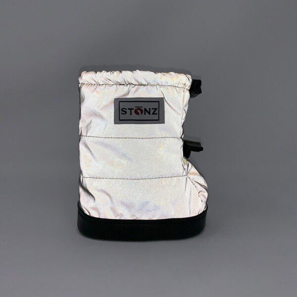 4. Side view of reflective silver toddler puffer bootie with Stonz logo on dark background