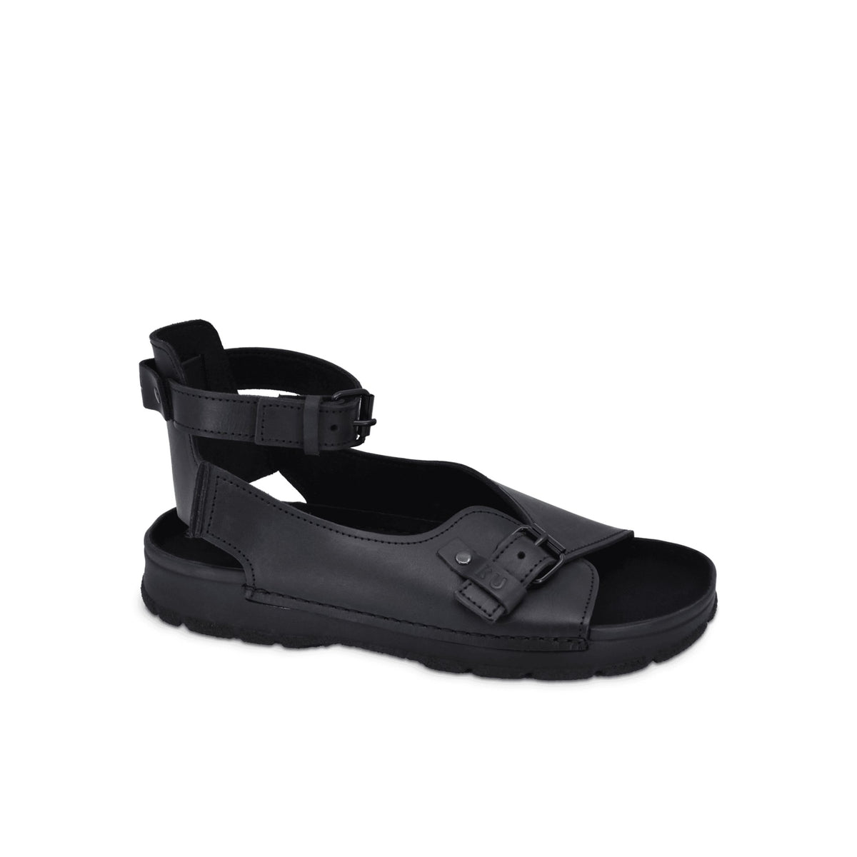 5. Side view of TOKU Athens black sandals by Omaking in studio, showcasing polyurethane outsole and microfiber lining