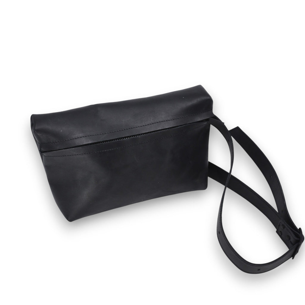 1. Black TOKU Lisbon bag by Omaking in studio setting, showcasing minimalist design and adjustable strap