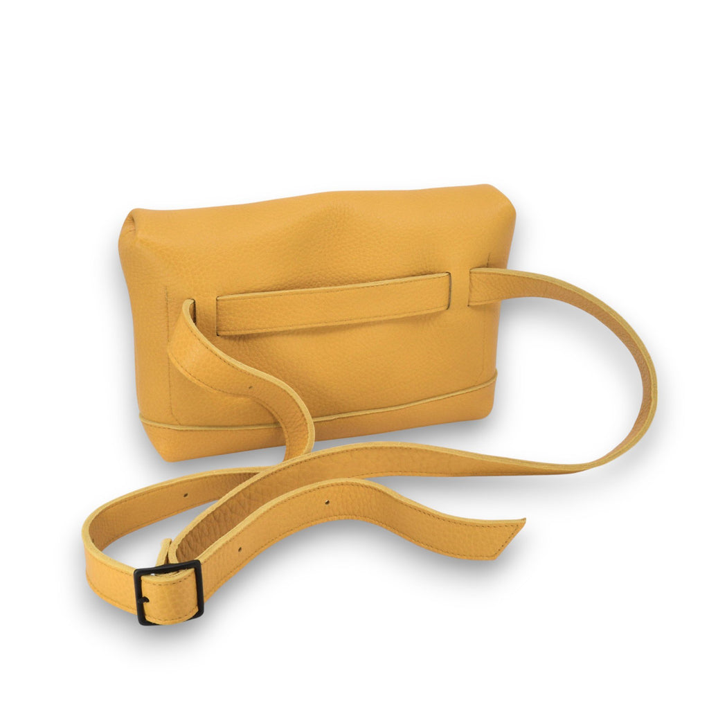 4. Studio image of yellow TOKU Lisbon bag by Omaking, showing adjustable buckle strap and genuine leather