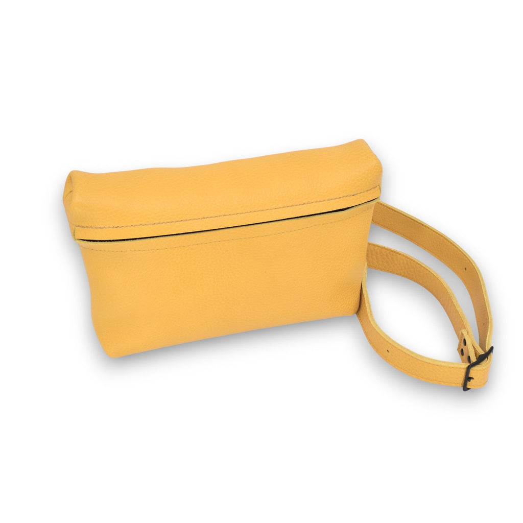5. Studio shot of yellow TOKU Lisbon bag by Omaking, featuring zipper closure and sleek design