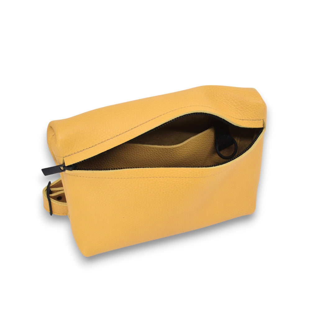 6. Close-up of yellow TOKU Lisbon bag by Omaking, showing spacious interior and premium leather material