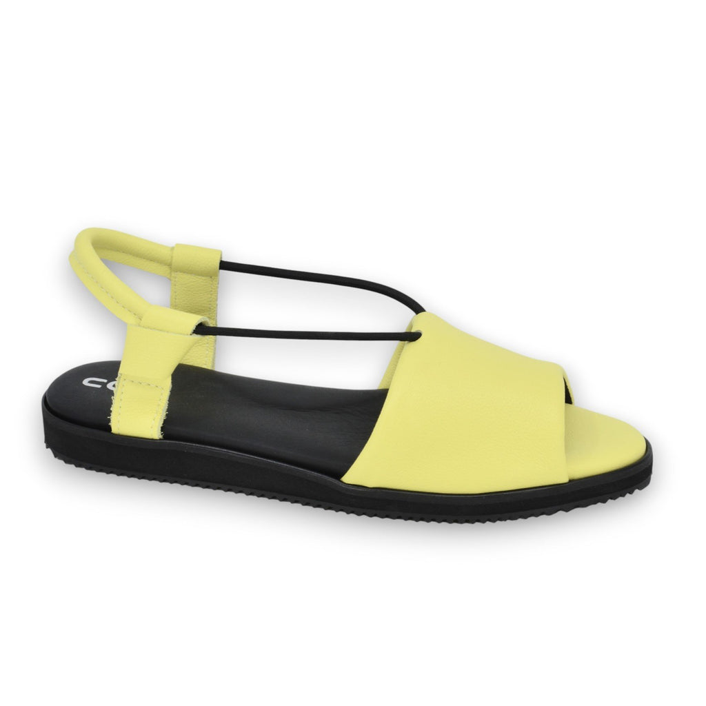 2. Studio shot of women's TOKU Berlin Sandals in lime yellow with ergonomic insole and EVA rubber outsole