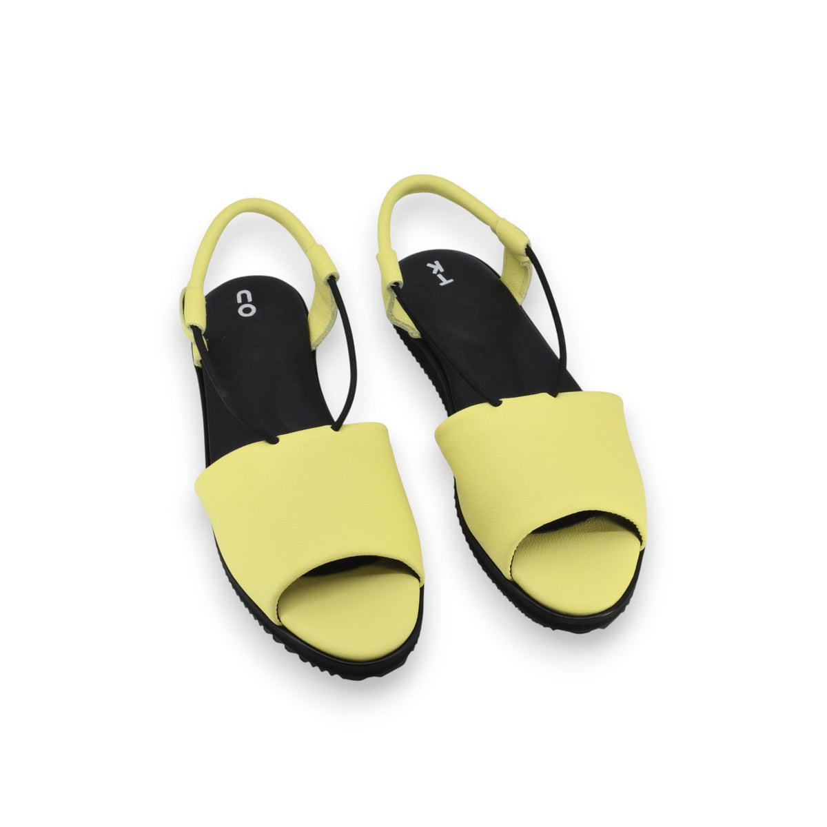3. Top view of women's TOKU Berlin Sandals in lime yellow showing leather upper and soft lycra lining
