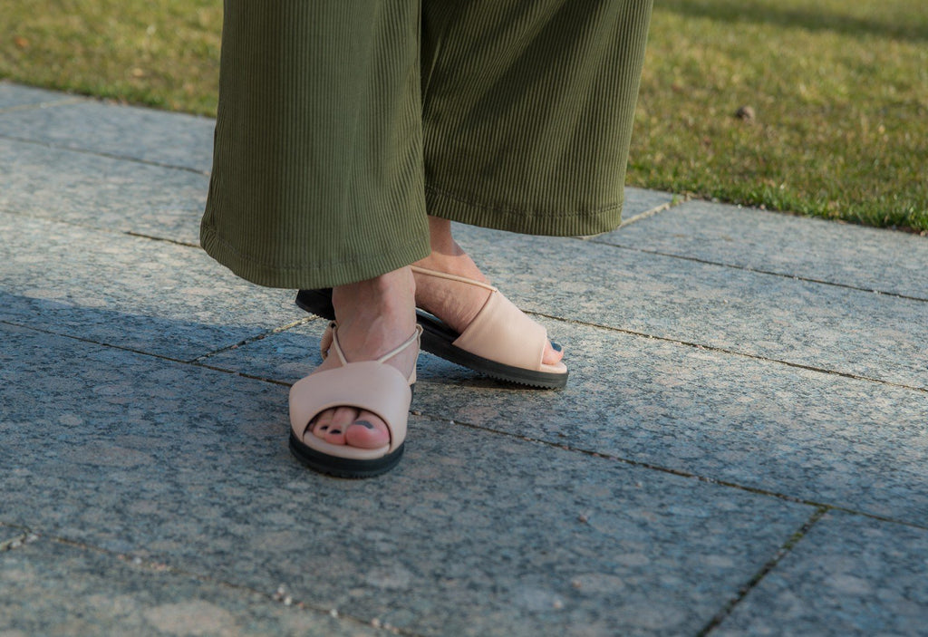 2. Women's nude TOKU Berlin sandals by Omaking worn outdoors, highlighting comfort and style