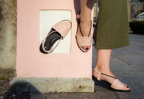 3. Women's nude TOKU Berlin sandals by Omaking, styled with green pants, showing versatility and chic design