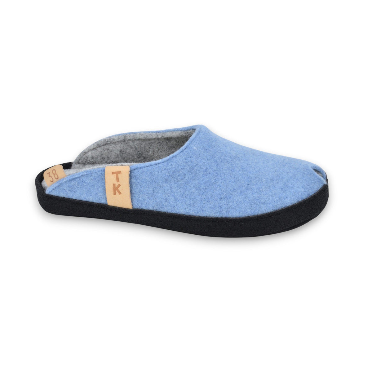 2. Side view of light blue TOKU Brussels slippers with black sole and tan label, made from lambswool felt