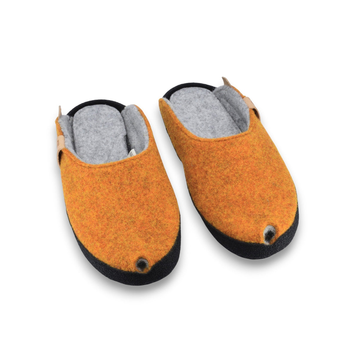 2. Pair of turmeric-colored TOKU Brussels slippers made from lambswool felt with black microfibre soles, shown from above on white background