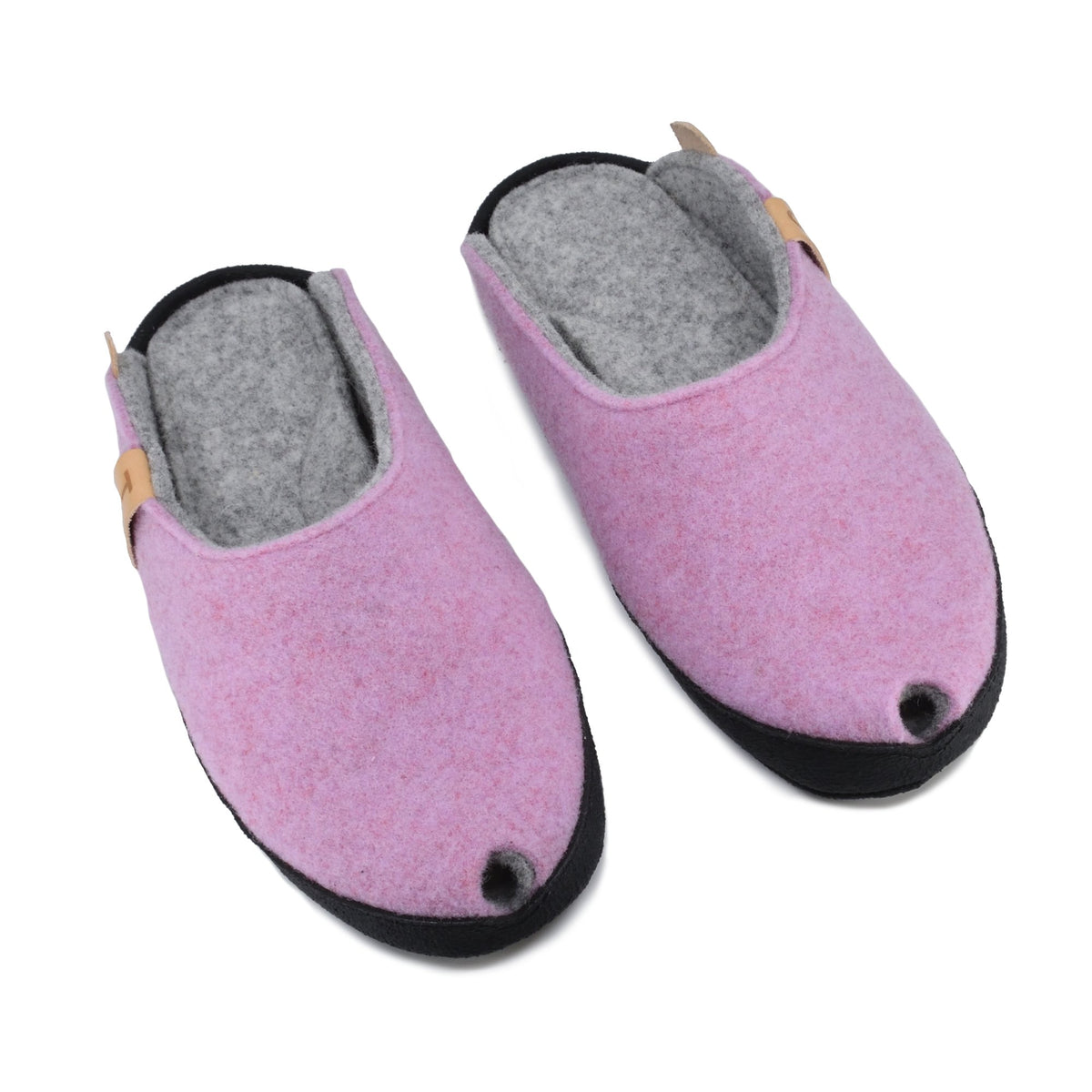 1. TOKU Brussels light pink slippers in natural lambswool felt with black microfibre sole, shown in studio