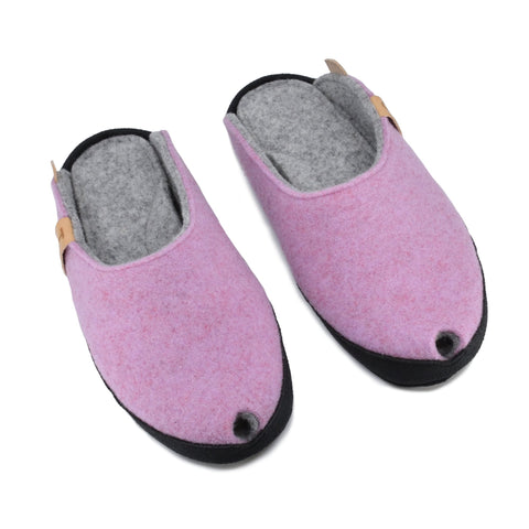 1. TOKU Brussels light pink slippers in natural lambswool felt with black microfibre sole, shown in studio