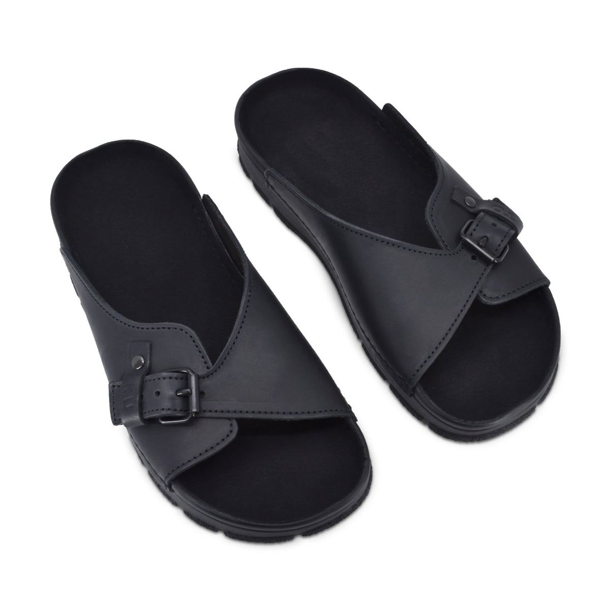 3. Studio image of black TOKU Rome Sandals by Omaking, featuring wide fit and buckle detail