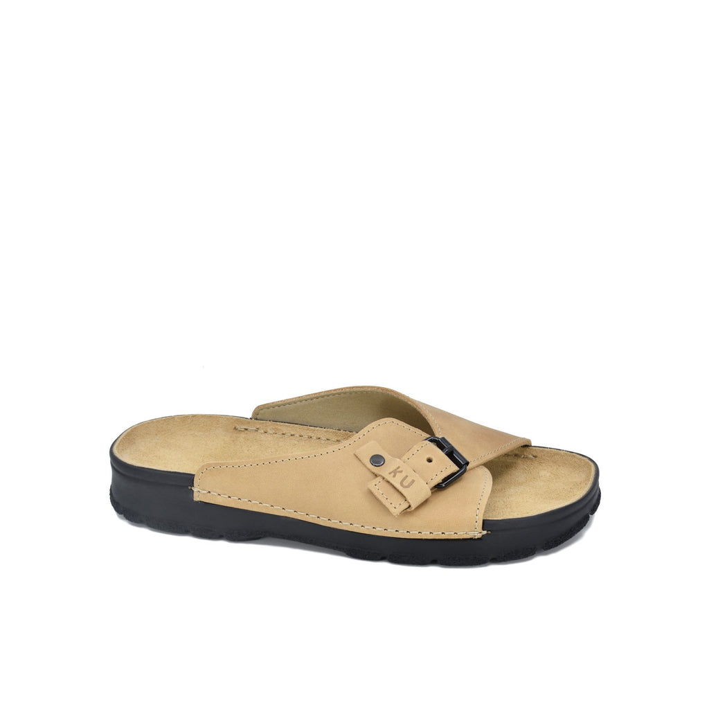 1. Omaking TOKU Rome Sandals in beige leather with black buckle, shown in studio setting