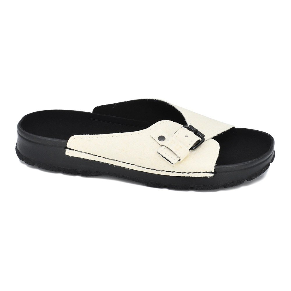 2. Studio image of TOKU Rome Vegan Sandal in white with black sole, featuring adjustable strap