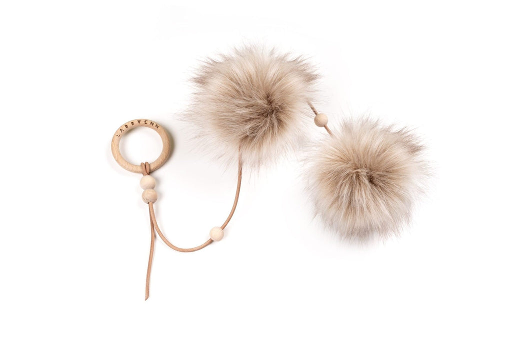 2. Labbvenn Tollo cat toy with two faux fur balls and wooden ring on white background
