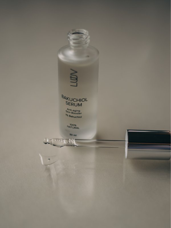 2. Open bottle of LUUV Anti-Aging Bakuchiol Serum with dropper, highlighting product texture