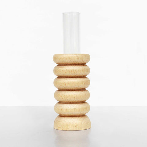2. Studio shot of Totem Wooden Vase - Medium Nº 1 by 5mm Paper, highlighting beech wood base and removable glass tube