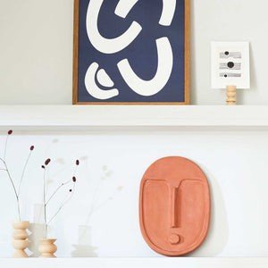 3. Home decor setting with Totem Wooden Vases by 5mm Paper, featuring beech wood bases and glass tubes