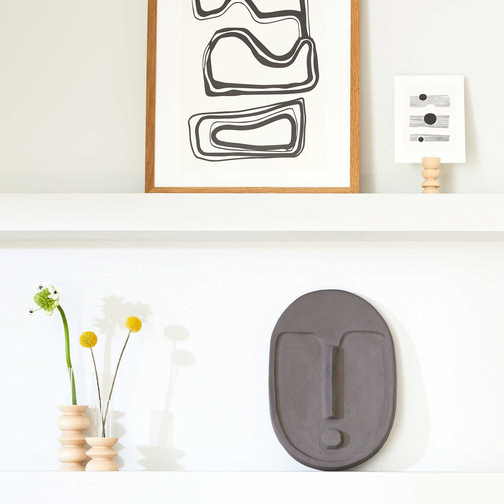 4. Totem Wooden Vase by 5mm Paper styled on a shelf with art and decor, lifestyle setting