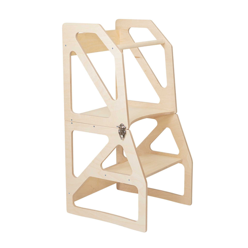 2. Natural birch plywood transformable kitchen tower with secure metal hinges and safety latches, shown in studio setting