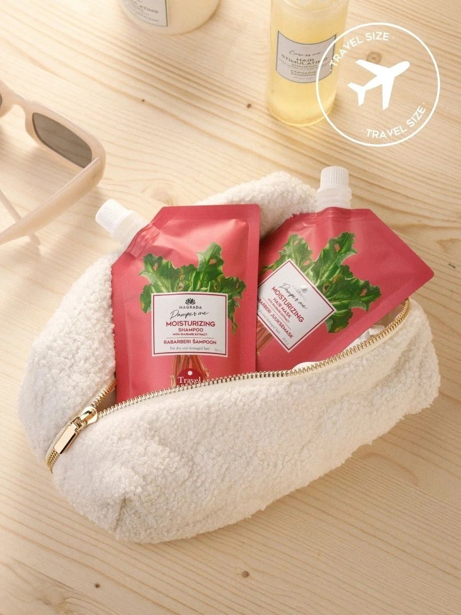 2. Magrada Organic Cosmetics travel size rhubarb shampoo in a toiletry bag, ideal for travel