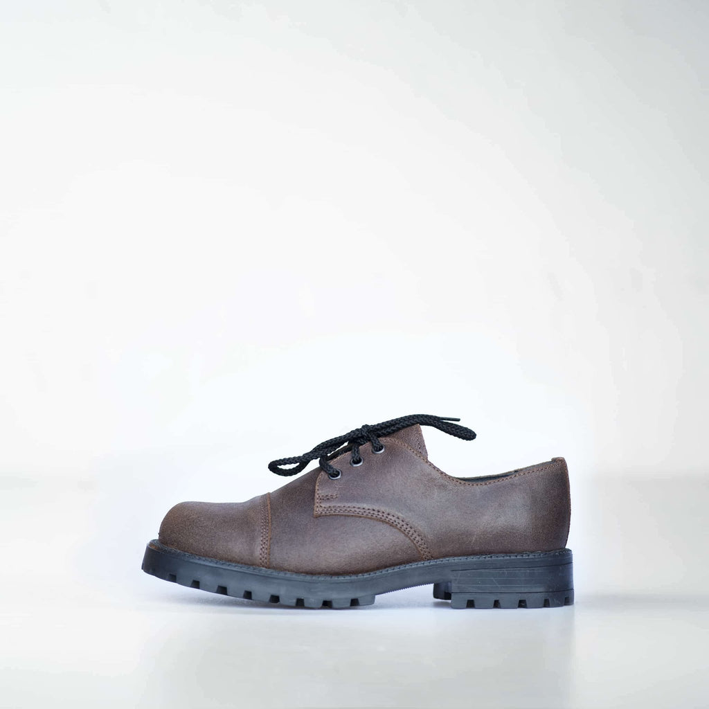 5. Side profile of unisex dark brown Samelin Widgets shoe with direct-injected PU outsole, studio shot