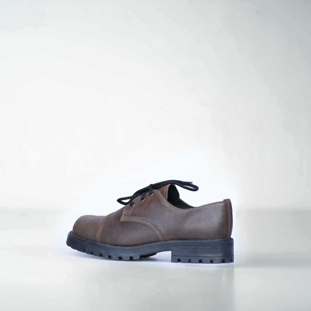 2. Side view of unisex dark brown Samelin Widgets shoe with rugged sole, studio shot